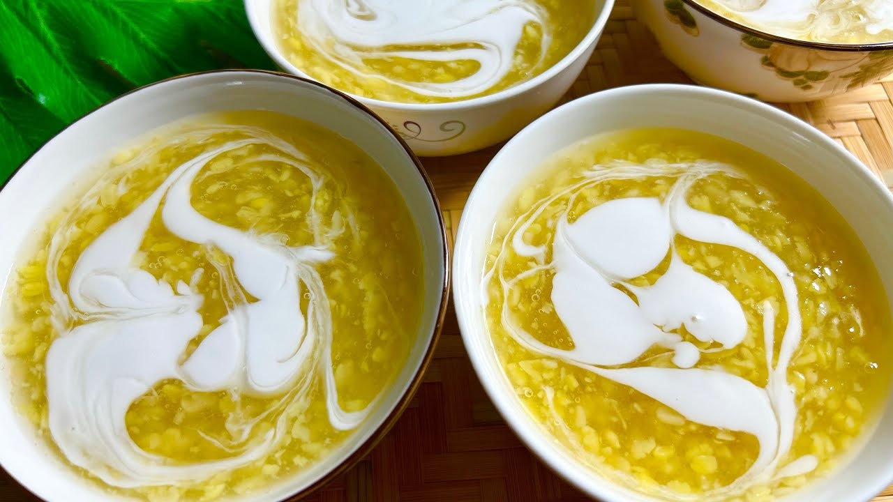 Soft green mung beans floating in creamy white coconut milk 